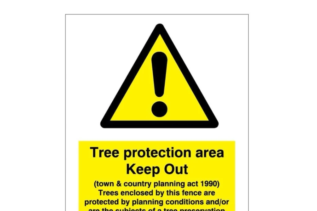 Tree Preservation Orders Signage - Yellow triangle warning and details written below.